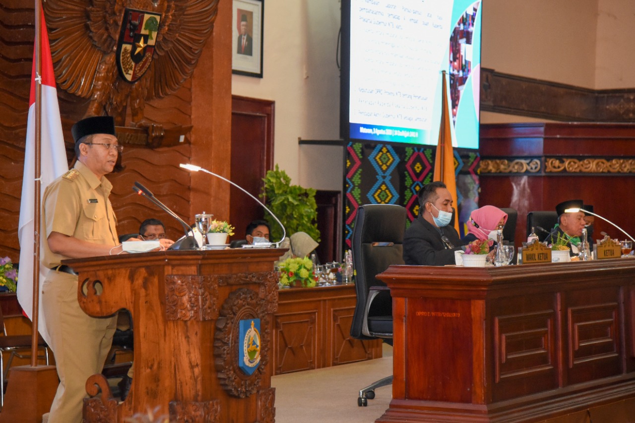 RAPERDA PENANGGULANGAN PENYAKIT MENULAR DAN KOMUNIKASI INFORMATIKA DISAHKAN DPRD